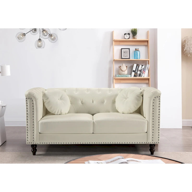 Causeuse Chesterfield en similicuir avec clous décoratifs