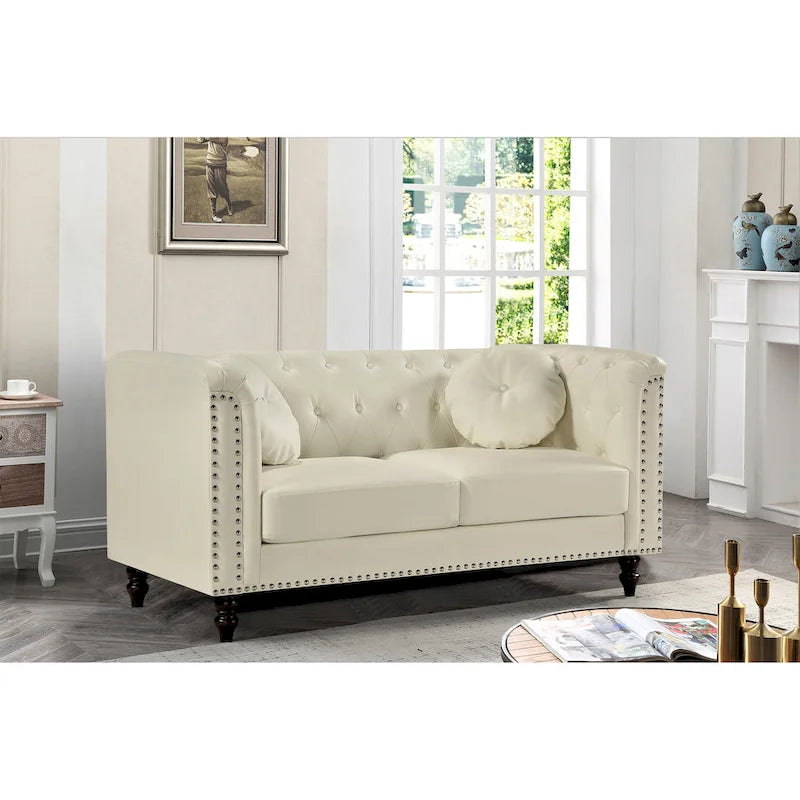 Causeuse Chesterfield en similicuir avec clous décoratifs